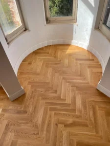 Pose collée dun parquet à Vincennes