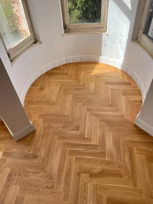 Pose collée dun parquet à Vincennes